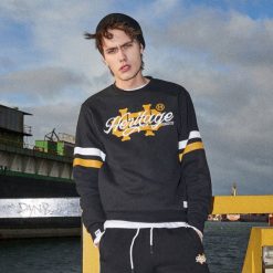 Bluza z kolekcji Heritage - Czarny. Czarne bluzy męskie marki Cropp, s, bez wzorów, bez kołnierzyka, bez rękawów, bez kaptura. Za 99,99 zł.