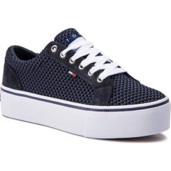 Sneakersy TOMMY JEANS - Wmn Textile City Sneaker EN0EN00409 Midnight 403. Niebieskie półbuty damskie marki Tommy Jeans, bez wzorów, z jeansu, bez obcasa, na obcasie, bez zapięcia. Za 359,00 zł.