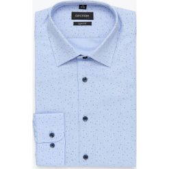 Koszula xmas 5014a długi rękaw slim fit niebieski. Niebieskie koszule męskie Recman, m, bez wzorów, bez kołnierzyka, z długim rękawem. Za 99,99 zł.
