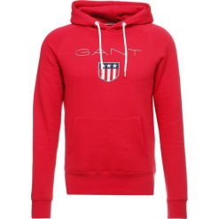 GANT SHIELD HOODIE Bluza z kapturem red. Niebieskie bluzy męskie rozpinane marki GANT. Za 419,00 zł.