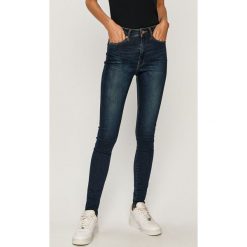 Tommy Jeans - Jeansy Sylvia. Niebieskie jeansy damskie Tommy Jeans, bez wzorów, z elastanu, z podwyższonym stanem. Za 449,90 zł.
