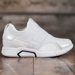 Ideal Shoes białe Wsuwane Trampki Fashion. Białe trampki i tenisówki damskie Ideal Shoes, bez wzorów, bez zapięcia. Za 67,90 zł.