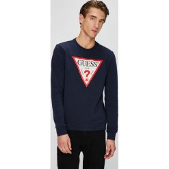 Guess Jeans - Bluza. Czarne bejsbolówki męskie Guess Jeans, l, z aplikacjami, z bawełny, bez kaptura. Za 349,90 zł.
