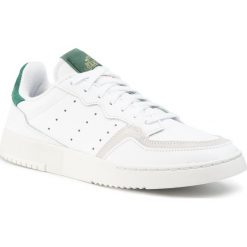 Buty adidas - Supercourt EF5884 Ftwwht/Ftwwht/Cgreen. Białe sneakersy męskie Adidas, na co dzień, bez wzorów, ze skóry, eleganckie, bez zapięcia. W wyprzedaży za 249,00 zł.