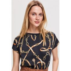 Bluzka z nadrukiem - Granatowy. Niebieskie bluzki damskie marki Reserved, s, z nadrukiem, bez kołnierzyka, bez rękawów. Za 59,99 zł.