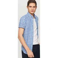 Koszula w kratkę regular fit - Niebieski. Niebieskie koszule męskie w kratę marki Reserved, s. Za 99,99 zł.