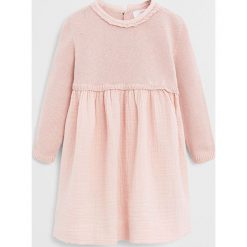 Mango Kids - Sukienka dziecięca Paris 62-80 cm. Różowe sukienki dziewczęce Mango Kids, bez wzorów, z bawełny, casualowe, z długim rękawem, długie, maxi, rozkloszowane. Za 119,90 zł.
