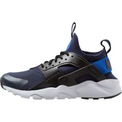Nike Sportswear AIR HUARACHE RUN ULTRA Tenisówki i Trampki obsidian/signal blue/black. Niebieskie trampki dziewczęce Nike Sportswear, z tworzywa sztucznego. Za 439,00 zł.