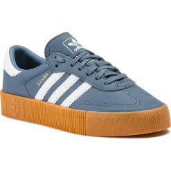 Buty adidas - Sambarose W DB2695 Rawste/Ftwwht/Gum2. Niebieskie buty sportowe damskie Adidas, bez wzorów, ze skóry, eleganckie, bez obcasa, na płaskiej podeszwie, bez zapięcia. W wyprzedaży za 279,00 zł.