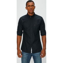 Tommy Jeans - Koszula. Czarne koszule męskie Tommy Jeans, m, bez wzorów, z bawełny, button down, z długim rękawem. W wyprzedaży za 239,90 zł.