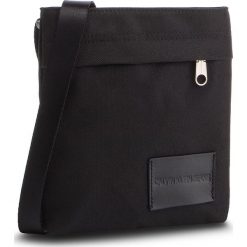 Saszetka CALVIN KLEIN JEANS - Sport Essentials Micro Flat K50K504510 001. Czarne torby męskie skórzane marki Calvin Klein Jeans, bez wzorów, z jeansu, młodzieżowe. Za 229,00 zł.