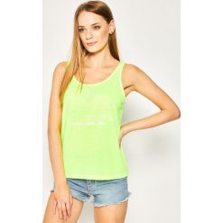Top Superdry Outline Pop W6010061A. Żółte bluzki damskie Superdry, bez wzorów, z bawełny, polo. Za 129,00 zł.