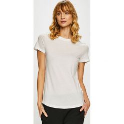 Reebok - Top. Białe topy damskie Reebok, s, bez wzorów, z bawełny, z okrągłym kołnierzem. W wyprzedaży za 79,90 zł.