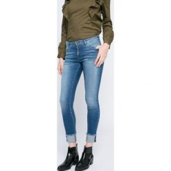 Only - Jeansy Carmen. Niebieskie jeansy damskie rurki ONLY, z bawełny. W wyprzedaży za 89,90 zł.