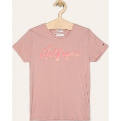 Tommy Hilfiger - T-shirt dziecięcy 98-176 cm. Niebieskie bluzki dziewczęce TOMMY HILFIGER, z aplikacjami, z bawełny, z okrągłym kołnierzem, z krótkim rękawem, krótkie, bez kaptura. Za 119,90 zł.