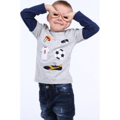 Bluzka chłopięca motyw piłkarski jasnoszara NDZ9092. Szare t-shirty chłopięce marki Fasardi, bez wzorów, bez rękawów. Za 49,00 zł.
