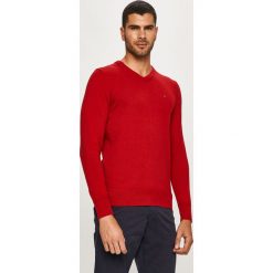 Tommy Hilfiger - Sweter MW0MW11673. Niebieskie swetry męskie TOMMY HILFIGER, s, z aplikacjami, z bawełny, bez kołnierzyka, bez kaptura. W wyprzedaży za 379,90 zł.