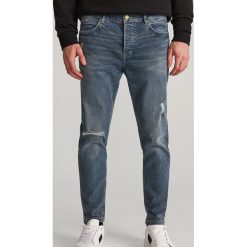 Jeansy carrot slim - Niebieski. Niebieskie jeansy męskie Reserved, m. Za 129,99 zł.