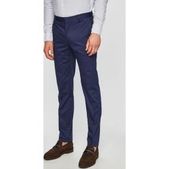 Calvin Klein - Spodnie. Brązowe spodnie męskie Calvin Klein, z haftami, z elastanu. W wyprzedaży za 269,90 zł.