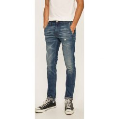 Guess Jeans - Jeansy. Niebieskie jeansy męskie Guess Jeans, m, z aplikacjami. Za 399,90 zł.