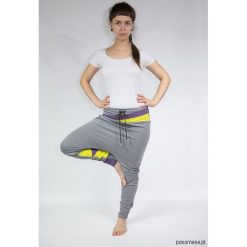 Spodnie dresowe damskie: Spodnie damskie baggy – dres (żółte trójkąty)