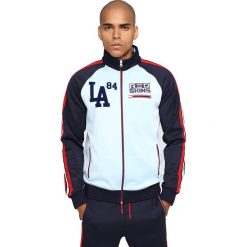 Bluza "Beach Shuba" w kolorze biało-granatowo-czerwonym. Niebieskie bluzy męskie Redskins, xxl, z nadrukiem, ze stójką, bez rękawów, bez kaptura. W wyprzedaży za 153,95 zł.