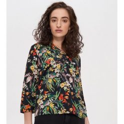 Wzorzysta bluzka - Czarny. Czarne bluzki damskie House, s, bez wzorów, bez kołnierzyka, bez rękawów. Za 59,99 zł.