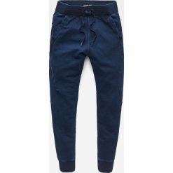 G-Star Raw - Spodnie. Niebieskie spodnie męskie G-Star RAW, na co dzień, m, bez wzorów, z elastanu, retro. W wyprzedaży za 479,90 zł.