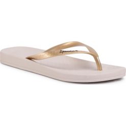 Japonki IPANEMA - Anatomica Tan Fem 81030 Beige/Gold 23097. Żółte klapki damskie Ipanema, bez wzorów, z tworzywa sztucznego, bez obcasa. Za 59,99 zł.