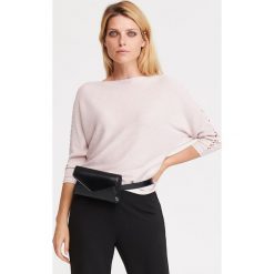 Błyszczący sweter - Różowy. Różowe swetry damskie Reserved, s, bez wzorów, bez rękawów, bez kaptura. Za 79,99 zł.