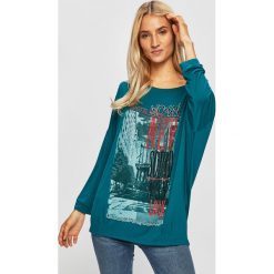 Extasy - Bluzka. Zielone bluzki damskie Extasy, s, z nadrukiem, z elastanu, z okrągłym kołnierzem, bez rękawów. W wyprzedaży za 79,90 zł.