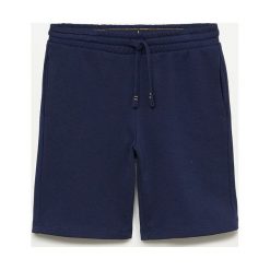 Mango Kids - Szorty dziecięce Paris 110-164 cm. Niebieskie spodenki chłopięce Mango Kids, bez wzorów, z bawełny, casualowe. Za 45,99 zł.