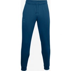 Under Armour Sportstyle Terry Spodnie dresowe Niebieski. Niebieskie spodnie męskie Under Armour, na imprezę, l, bez wzorów, z bawełny. Za 274,95 zł.