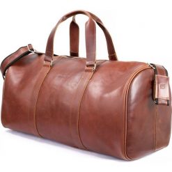 CORTEZ Koniakowa męska torba ze skóry Podróżna smooth leather. Szare torby podróżne marki Brødrene, ze skóry, duże. Za 750,00 zł.