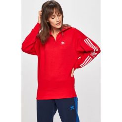 Adidas Originals - Bluza. Czerwone bluzy damskie adidas Originals, bez wzorów, z elastanu, z krótkim rękawem, krótkie, bez kaptura. W wyprzedaży za 219,90 zł.