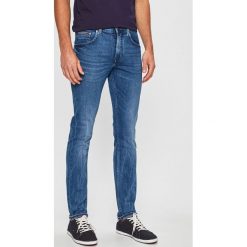 Tommy Hilfiger - Jeansy. Niebieskie jeansy męskie TOMMY HILFIGER, bez wzorów. W wyprzedaży za 449,90 zł.