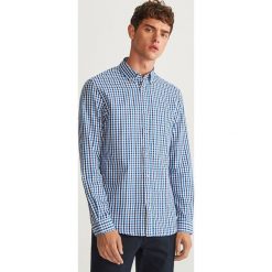 Koszula w kratkę regular fit - Niebieski. Niebieskie koszule męskie na spinki Reserved, l, w kratkę. Za 99,99 zł.