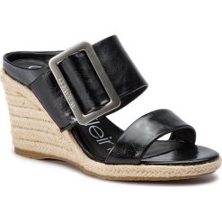 Espadryle CALVIN KLEIN - Brittina Varnished Crackle E8886 Black. Czarne espadryle damskie marki Calvin Klein, bez wzorów, ze skóry ekologicznej, bez obcasa, na obcasie. Za 629,00 zł.