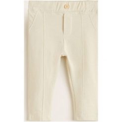 Mango Kids - Spodnie dziecięce Albory 80-104 cm. Szare spodnie chłopięce marki Mango Kids, bez wzorów, z bawełny, casualowe. Za 59,90 zł.