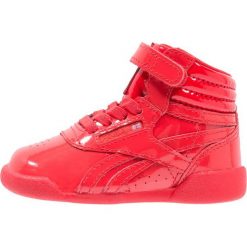 Reebok Classic Tenisówki i Trampki wysokie primal red. Czerwone trampki dziewczęce marki Reebok Classic, z materiału. Za 169,00 zł.