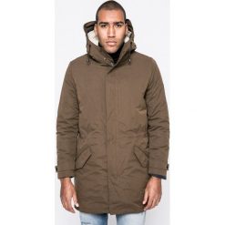 Tommy Hilfiger - Parka. Pomarańczowe parki męskie marki TOMMY HILFIGER, xl, z poliesteru, długie, z kapturem. W wyprzedaży za 1099,00 zł.