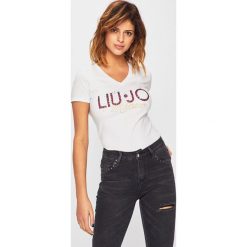 Liu Jo - Top. Różowe bluzki damskie Liu Jo, s, z aplikacjami, z elastanu, z włoskim kołnierzykiem, z krótkim rękawem. Za 269,90 zł.