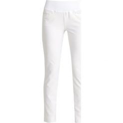 Puma Golf PULL ON PANT Spodnie materiałowe bright white. Białe bryczesy damskie Puma Golf, xs, z elastanu, na golfa. Za 359,00 zł.