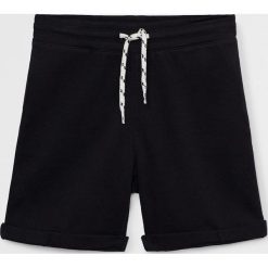 Mango Kids - Szorty dziecięce Joel 110 - 164 cm. Niebieskie spodenki chłopięce Mango Kids, bez wzorów, z bawełny, casualowe. Za 59,90 zł.