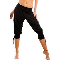 Damskie spodnie w tureckim stylu Fantasia. Różowe spodnie damskie MrsFitness, z mikrofibry. Za 110,99 zł.