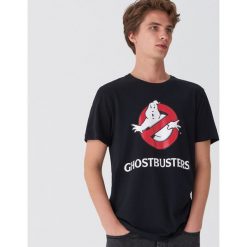 Koszulka z nadrukiem Ghostbusters - Czarny. Czarne koszulki męskie House, s, z nadrukiem, bez kołnierzyka, bez rękawów. Za 49,99 zł.