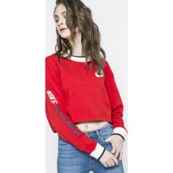 Nike Sportswear - Bluza dwustronna. Czerwone bluzy damskie z nadrukiem marki Nike Sportswear, s, z elastanu, bez kaptura. W wyprzedaży za 249,90 zł.