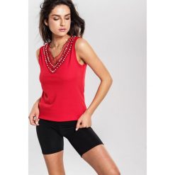 Czerwony Top Life Guard. Czerwone bluzki damskie other, s, bez wzorów, bez kołnierzyka. Za 34,99 zł.