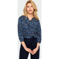 Elegancka bluzka. Bluzki damskie Greenpoint, bez wzorów, z wiskozy, eleganckie, bez kołnierzyka, bez rękawów. Za 59,99 zł.