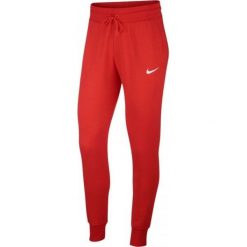 Nike - Spodnie. Czerwone spodnie damskie Nike, s, z bawełny. Za 259,90 zł.